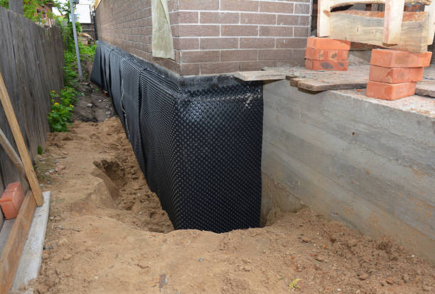 SJ Waterproofing Pros technician performing targeted Emergency Waterproofing assessment in Altoona, PA